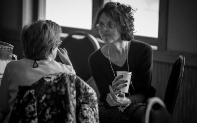 Two mothers speaking at an Eshel retreat. (Courtesy)