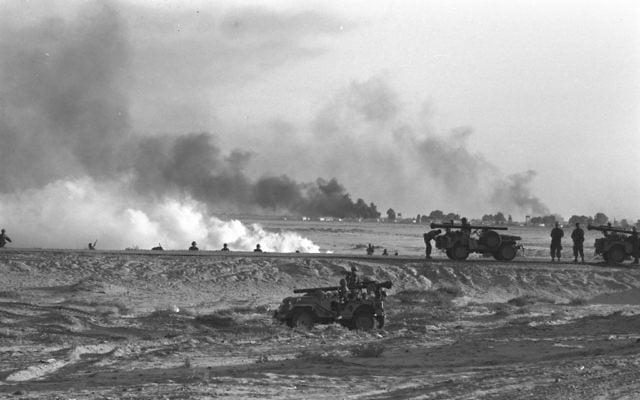 Smoke rising from targets hit by Israeli artillery at the Suez Canal during the Six Day War. (Han Micha/Government Press Office) Smoke rising from targets hit by Israeli artillery at the Suez Canal during the Six Day War. (Han Micha/Government Press Office)