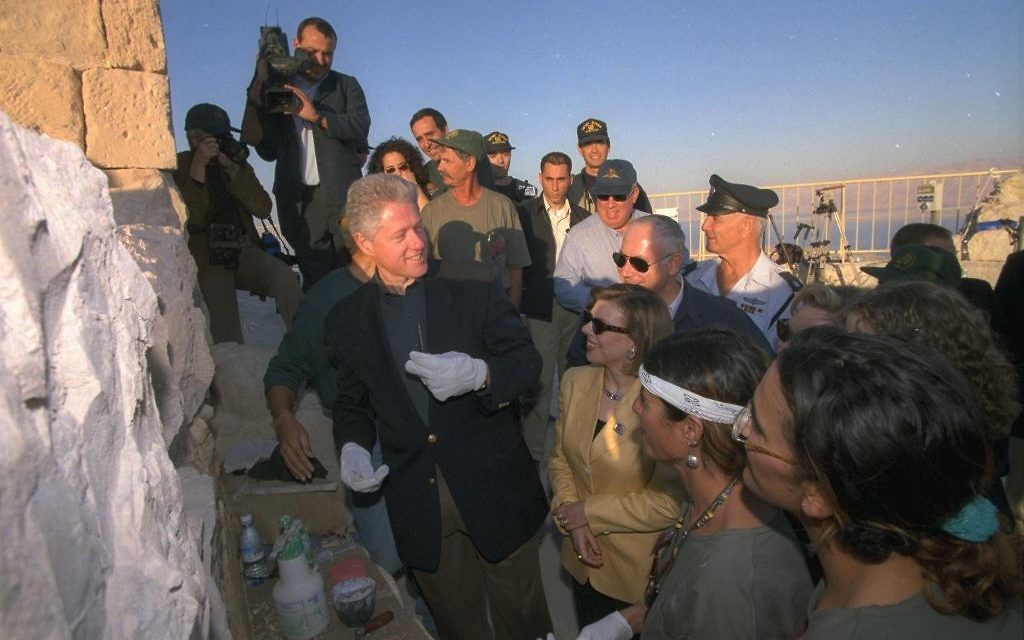 US President Bill Clinton atop Masada, as Prime Minister Netanyahu and his wife Sara look on, December 1998 (Avi Ohayon/GPO) US President Bill Clinton atop Masada, as Prime Minister Netanyahu and his wife Sara look on, December 1998 (Avi Ohayon/GPO)