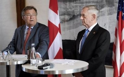 US Secretary of Defense Jim Mattis, right, stands with Danish Defense Minister Claus Hjort Frederiksen, during a press conference, in Copenhagen, Denmark, Tuesday, May 9, 2017. (Stine Tidsvilde/Ritzau Foto via AP)