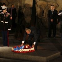 US President George W Bush lays a wreath in memory of the six million Jewish Holocaust victims in the Hall of Remembrance at the Yad Vashem Holocaust museum in Jerusalem, 11 January 2008. (Michal Fattal/Flash90)