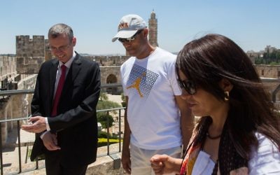 Tourism Minister Yariv Levin (l) walks in Jerusalem's Old City with former New York Yankees professional baseball pitcher Mariano Rivera (C) on June 18, 2015. (Yonatan Sindel/Flash90) Tourism Minister Yariv Levin (l) walks in Jerusalem's Old City with former New York Yankees professional baseball pitcher Mariano Rivera (C) on June 18, 2015. (Yonatan Sindel/Flash90)