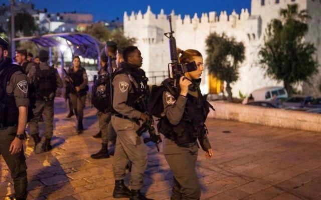 Illustrative: Border Police officers secure the area in front of Damascus Gate after a brief conflict with some Palestinian men on April 24, 2017. (Noah Park/Flash90) Illustrative: Border Police officers secure the area in front of Damascus Gate after a brief conflict with some Palestinian men on April 24, 2017. (Noah Park/Flash90)