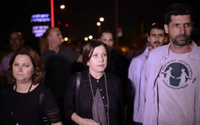 Meretz chairwoman Zehava Galon and Meretz MK Michal Rozin attend an Israeli-Palestinian memorial ceremony in Tel Aviv on April 30, 2017, as Israel marks its annual Memorial Day for fallen soldiers and victims of terror. (Tomer Neuberg/Flash90) Meretz chairwoman Zehava Galon and Meretz MK Michal Rozin attend an Israeli-Palestinian memorial ceremony in Tel Aviv on April 30, 2017, as Israel marks its annual Memorial Day for fallen soldiers and victims of terror. (Tomer Neuberg/Flash90)