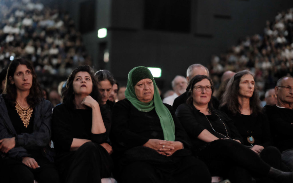 Participants at an Israeli-Palestinian memorial ceremony held in Tel Aviv on April 30, 2017, as Israel marked its annual Memorial Day for fallen soldiers and victims of terror. (Tomer Neuberg/Flash90) Participants at an Israeli-Palestinian memorial ceremony held in Tel Aviv on April 30, 2017, as Israel marked its annual Memorial Day for fallen soldiers and victims of terror. (Tomer Neuberg/Flash90)