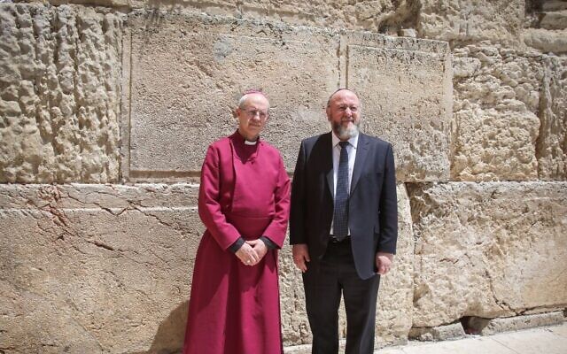 The Archbishop of Cantebury Justin Welby (l) and the British Chief Rabbi Ephraim Mirvis, visit the Western Wall, Judaism's holiest site, in Jerusalem's Old City, on May 3, 2017. (Yonatan Sindel/Flash90) The Archbishop of Cantebury Justin Welby (l) and the British Chief Rabbi Ephraim Mirvis, visit the Western Wall, Judaism's holiest site, in Jerusalem's Old City, on May 3, 2017. (Yonatan Sindel/Flash90)
