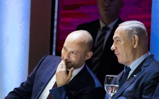 Education Minister Naftali Bennett speaks with Prime Minister Benjamin Netanyahu during the Israel Prize ceremony at the International Conference Center (ICC) in Jerusalem on May 2, 2017. (Yonatan Sindel/Flash90) Education Minister Naftali Bennett speaks with Prime Minister Benjamin Netanyahu during the Israel Prize ceremony at the International Conference Center (ICC) in Jerusalem on May 2, 2017. (Yonatan Sindel/Flash90)
