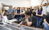 Israel Radio employees during their final broadcast on May 10, 2017. (Noam Revkin Fentonr/Flash90)
