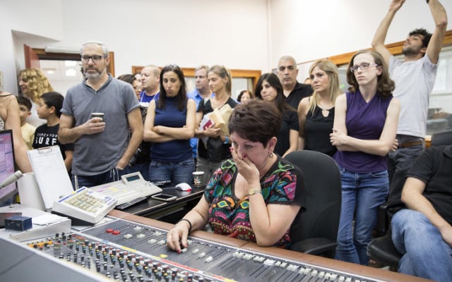 Israel Radio employees during their final broadcast on May 10, 2017. (Noam Revkin Fentonr/Flash90) Israel Radio employees during their final broadcast on May 10, 2017. (Noam Revkin Fentonr/Flash90)