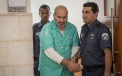 Jamil Tamimi, 57, who stabbed and killed Hannah Bladon on the Jerusalem Light Rail is brought into the Jerusalem District Court on May 11, 2017. (Hadas Parush/Flash90)