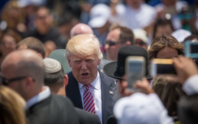 US President Donald Trump greeting Israeli ministers during his welcome ceremony at Ben Gurion Airport, May 22, 2017. (Hadas Parush/Flash90) US President Donald Trump greeting Israeli ministers during his welcome ceremony at Ben Gurion Airport, May 22, 2017. (Hadas Parush/Flash90)