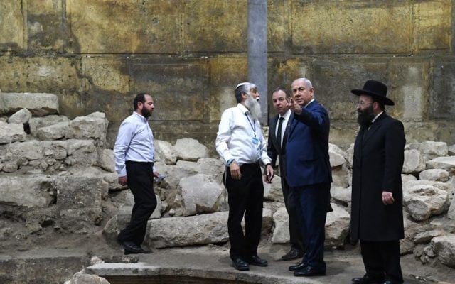 Prime Minister Benjamin Netanyahu (second-right) seen at the Western Wall tunnels in Jerusalem, before the start of a special weekly cabinet meeting, marking the 50th anniversary of Jerusalem's reunification, on May 28, 2017. (Kobi Gideon/GPO) Prime Minister Benjamin Netanyahu (second-right) seen at the Western Wall tunnels in Jerusalem, before the start of a special weekly cabinet meeting, marking the 50th anniversary of Jerusalem's reunification, on May 28, 2017. (Kobi Gideon/GPO)