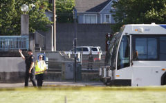 Police investigate a deadly stabbing on a Metropolitan Area Express train in northeast Portland, Oregon, May 26, 2017. (Jim Ryan/The Oregonian via AP)