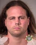 This booking photo provided by Multnomah County Sheriff's Office shows Jeremy Joseph Christian. Authorities on Saturday, May 27, 2017 identified Christian as the suspect in the fatal stabbing of two people on a Portland light-rail train in Oregon. (Multnomah County Sheriff's Office via AP)