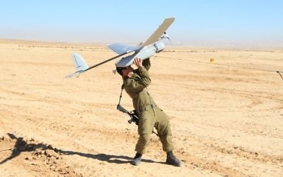 Illustrative: An IDF soldier from the Artillery Corps launches an Elbit Skylark drone, known in the IDF as a Sky Rider, on January 21, 2013. (Cpl. Zev Marmorstein/Israel Defense Forces)