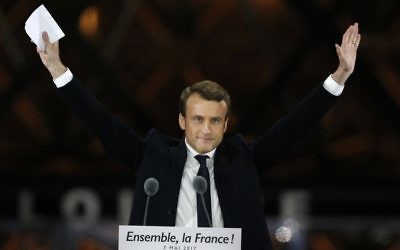 French President-elect Emmanuel Macron gestures during a victory celebration outside the Louvre museum in Paris, France, on Sunday, May 7, 2017. (AP Photo/Thibault Camus)