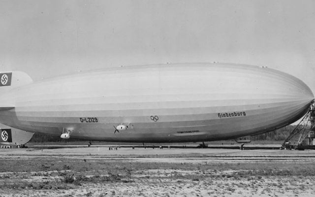 Airship LZ-129 Hindenburg, with Swastika on its tail, on a previous visit to Lakehurst in 1936. (US Department of the Navy. Bureau of Aeronautics. Naval Aircraft Factory, Philadelphia, Pennsylvania)