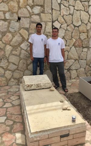 High school students Yahel Shilyan (left) and Naveh Hod researched the story of Yafim Davidovich, a Russian colonel who spied for Israel and was buried on the Mount of Olives (Jessica Steinberg/Times of Israel)