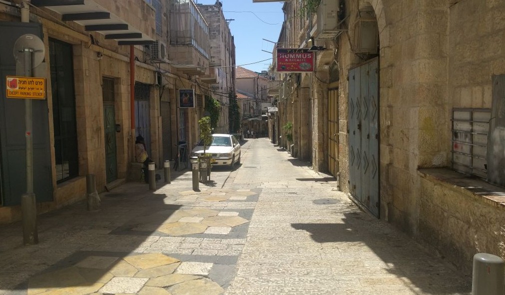 A deserted street in Jerusalem‘s Old City on May 22, 2017. A general strike and heavy security for the Trump visit emptied the Old City of the regular hustle and bustle of a Monday morning. (Melanie Lidman/Times of Israel)