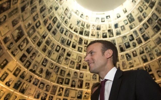In this file photo dated Sunday, Sept. 6, 2015, French Minister of Economy, Industry and Digital Affairs Emmanuel Macron, visits the Hall of Names at the Yad Vashem Holocaust Memorial in Jerusalem. (Sebastian Scheiner/AP) In this file photo dated Sunday, Sept. 6, 2015, French Minister of Economy, Industry and Digital Affairs Emmanuel Macron, visits the Hall of Names at the Yad Vashem Holocaust Memorial in Jerusalem. (Sebastian Scheiner/AP)