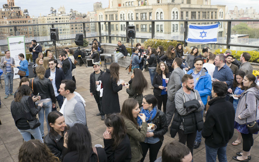 Participants in a past Shavuot program at JCC Manhattan gather on the JCC's roof. The JCC's annual event lasts all night and features an array of classes and workshops. (Courtesy of JCC Manhattan/via JTA) Participants in a past Shavuot program at JCC Manhattan gather on the JCC's roof. The JCC's annual event lasts all night and features an array of classes and workshops. (Courtesy of JCC Manhattan/via JTA)