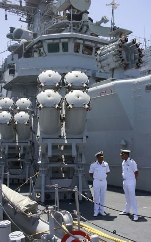 Sunil Kumar Roy, left, captain of the INS Mumbai speaks to a fellow officer on board his ship, which is docked in Haifa as part of an official visit by the Indian Navy on May 10, 2017. (Judah Ari Gross/Times of Israel) Sunil Kumar Roy, left, captain of the INS Mumbai speaks to a fellow officer on board his ship, which is docked in Haifa as part of an official visit by the Indian Navy on May 10, 2017. (Judah Ari Gross/Times of Israel)