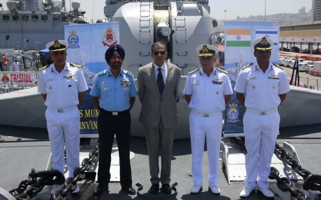 From left, Cpt. Sanjay Sachdeva, Indian defense attache Gp. Cpt. Tejpal Singh, Indian Ambassador Pavan Kapoor, Rear Admiral RB Pandit and Cpt. Sunil Kumar Roy pose for a photograph on board the INS Trishul, docked in Haifa as part of an official visit by the Indian Navy on May 10, 2017. (Judah Ari Gross/Times of Israel)