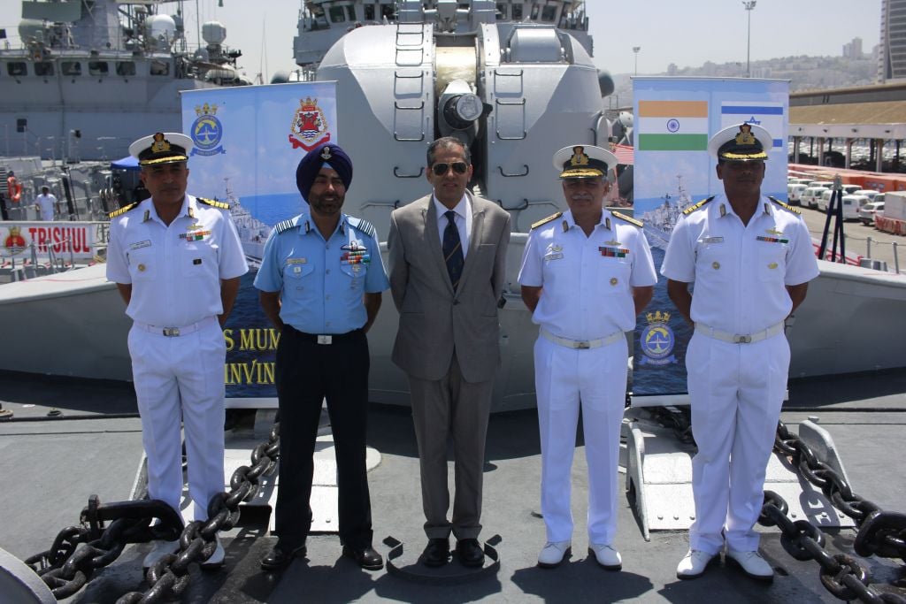 From left, Cpt. Sanjay Sachdeva, Indian defense attache Gp. Cpt. Tejpal Singh, Indian Ambassador Pavan Kapoor, Rear Admiral RB Pandit and Cpt. Sunil Kumar Roy pose for a photograph on board the INS Trishul, docked in Haifa as part of an official visit by the Indian Navy on May 10, 2017. (Judah Ari Gross/Times of Israel) From left, Cpt. Sanjay Sachdeva, Indian defense attache Gp. Cpt. Tejpal Singh, Indian Ambassador Pavan Kapoor, Rear Admiral RB Pandit and Cpt. Sunil Kumar Roy pose for a photograph on board the INS Trishul, docked in Haifa as part of an official visit by the Indian Navy on May 10, 2017. (Judah Ari Gross/Times of Israel)