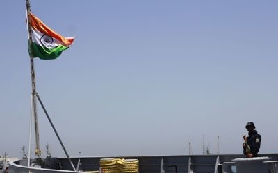 An Indian sailor stands guard aboard the INS Trishul, docked in the Haifa port for a visit, on May 10, 2017. (Judah Ari Gross/Times of Israel)