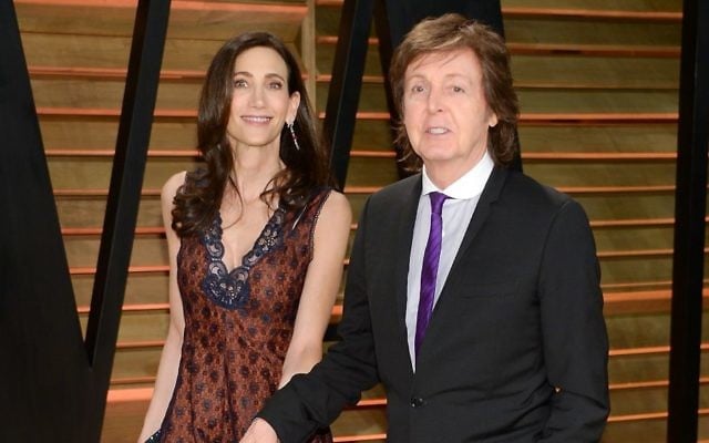 Sir Paul McCartney and wife Nancy Shevell attend the 2014 Vanity Fair Oscar Party on March 2, 2014, in West Hollywood, California. (Evan Agostini/Invision/AP)
