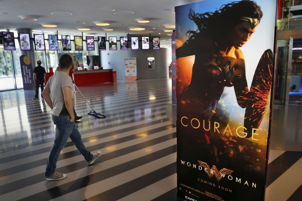 A man walks past a poster promoting the movie, Wonder Woman, at a cinema in downtown Beirut, Lebanon, Tuesday, May 30, 2017. (AP Photo/Hussein Malla) A man walks past a poster promoting the movie, Wonder Woman, at a cinema in downtown Beirut, Lebanon, Tuesday, May 30, 2017. (AP Photo/Hussein Malla)