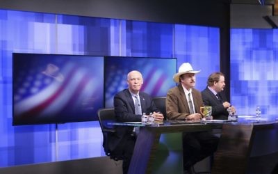 In this April 29, 2017, photo, three candidates, from left, Republican Greg Gianforte, Democrat Rob Quist and Libertarian Mark Wicks vying to fill Montana's only congressional seat await the start of their only televised debate in Great Falls, Montana (AP Photo/Bobby Caina Calvan)
