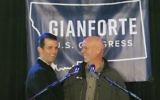 In this May 11, 2017, file photo Republican Greg Gianforte, right, welcomes Donald Trump Jr., the US president's son, onto the stage at a rally in East Helena, Montana. (AP Photo/Bobby Caina Calvan, File)