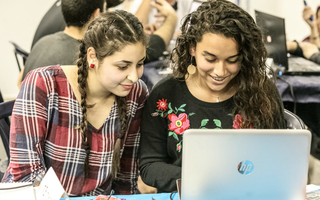 Arab students working on a project at Moona, a nonprofit technology incubator in the Galilee that aims to build bridges between Israeli Jews and Arab youth through space technologies (Courtesy) Arab students working on a project at Moona, a nonprofit technology incubator in the Galilee that aims to build bridges between Israeli Jews and Arab youth through space technologies (Courtesy)