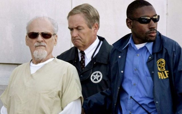 Tony Alamo (L) is escorted to a waiting police car outside the federal courthouse in Texarkana, Arkansas, July 23, 2009. (AP Photo/Danny Johnston, File) Tony Alamo (L) is escorted to a waiting police car outside the federal courthouse in Texarkana, Arkansas, July 23, 2009. (AP Photo/Danny Johnston, File)