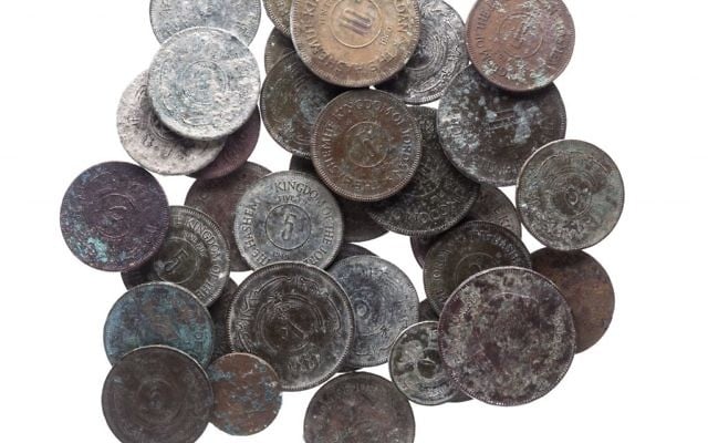 Jordanian Hashemite Kingdom coins, dated 1948-1967, and a coin dated to 1991 with the portrait of King Hussain, collected by the Temple Mount Sifting Project. (Tal Rogovski)