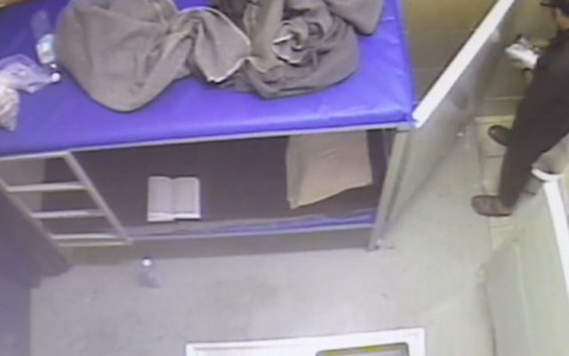 Marwan Barghouti eating in his cell, in footage released May 7, 2017, by the Israel Prisons Service (Channel 2 screenshot)