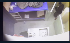 Marwan Barghouti seen in video footage released May 7, 2017, unwrapping a candy bar in his cell while ostensibly leading a hunger strike among Palestinian prisoners. (Screen capture: Israeli Prison Service)