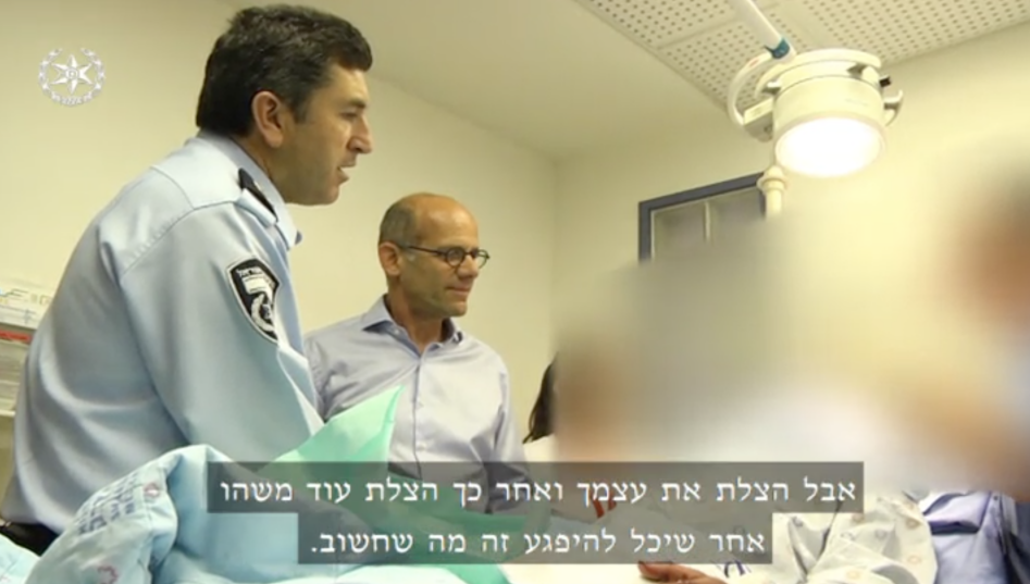 Jerusalem police chief Yoram Halevy visits a policeman recovering in hospital after being stabbed by a Jordanian man in the Old City, May 13, 2017. (Channel 2 screenshot) Jerusalem police chief Yoram Halevy visits a policeman recovering in hospital after being stabbed by a Jordanian man in the Old City, May 13, 2017. (Channel 2 screenshot)