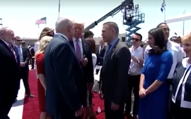 Prime Minister Benjamin Netanyahu, center left, US President Donald Trump, center, and Internal Security Minister Gilad Erdan, center right, on the tarmac at Ben Gurion International Airport, May 22, 2017. (Screen capture: GPO) Prime Minister Benjamin Netanyahu, center left, US President Donald Trump, center, and Internal Security Minister Gilad Erdan, center right, on the tarmac at Ben Gurion International Airport, May 22, 2017. (Screen capture: GPO)