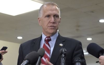 In this April 7, 2017 file photo, Sen. Thom Tillis, R-N.C., speaks to reporters on Capitol Hill in Washington. Tillis collapsed Wednesday, May 17, 2017, during Washington race, received CPR, as was taken away in ambulance. (AP Photo/Susan Walsh, File)