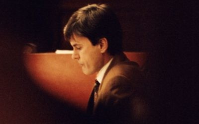 In this photo from February 2, 1995, John Ausonius sits during a trial in Stockholm's district court. (Tobias Rostlund/TT News Agency via AP, File)