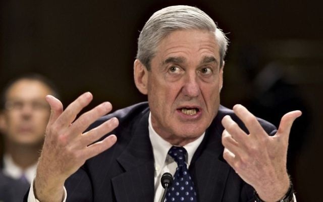 In this June 19, 2013, file photo, former FBI Director Robert Mueller testifies on Capitol Hill in Washington. (AP Photo/J. Scott Applewhite, File)