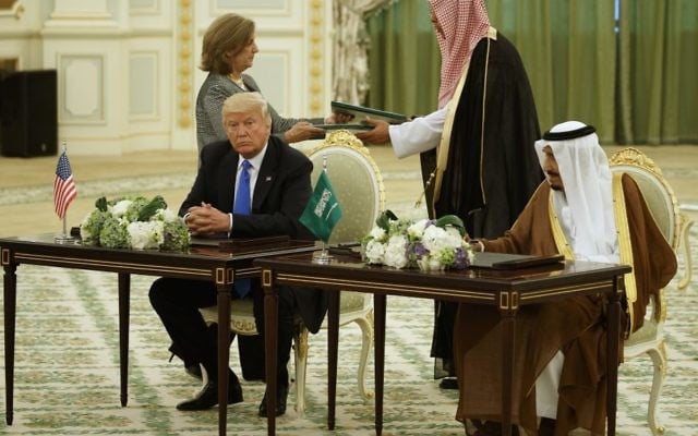 US President Donald Trump and Saudi King Salam participate in a signing ceremony at the Royal Court Palace, Saturday, May 20, 2017, in Riyadh. (AP Photo/Evan Vucci)