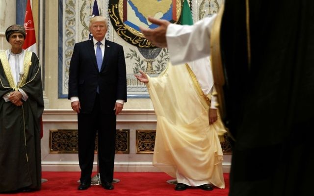 US President Donald Trump poses for photos with leaders at the Gulf Cooperation Council meeting, at the King Abdulaziz Conference Center, Sunday, May 21, 2017, in Riyadh, Saudi Arabia. (AP Photo/Evan Vucci)