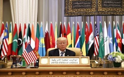US President Donald Trump waits to deliver a speech to the Arab Islamic American Summit, at the King Abdulaziz Conference Center, in Riyadh, Saudi Arabia, May 21, 2017. (AP/Evan Vucci) 