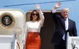 US President Donald Trump and first lady Melania Trump wave as they board Air Force One at Andrews Air Force Base, Maryland, May 19, 2017, prior to his departure on his first overseas trip. (AP Photo/Alex Brandon)