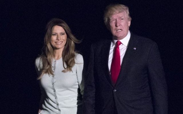President Donald Trump and first lady Melania Trump walk from Marine One across the South Lawn to White House in Washington, Saturday, May 27, 2017, as they return from Sigonella, Italy. (AP/Carolyn Kaster) President Donald Trump and first lady Melania Trump walk from Marine One across the South Lawn to White House in Washington, Saturday, May 27, 2017, as they return from Sigonella, Italy. (AP/Carolyn Kaster)