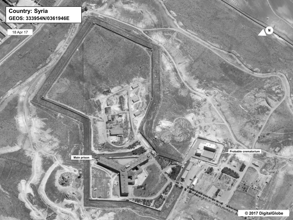 A satellite image of what the State Department described as a building in a prison complex in Syria that was modified to support a crematorium, April 18, 2017. (State Department/DigitalGlobe via AP) A satellite image of what the State Department described as a building in a prison complex in Syria that was modified to support a crematorium, April 18, 2017. (State Department/DigitalGlobe via AP)