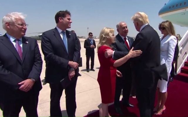 Prime Minister Benjamin Netanyahu and his wife, Sara, greet US President Donald Trump upon his arrival at Ben Gurion Airport on Monday, May 22, 2017 (screen capture: GPO)